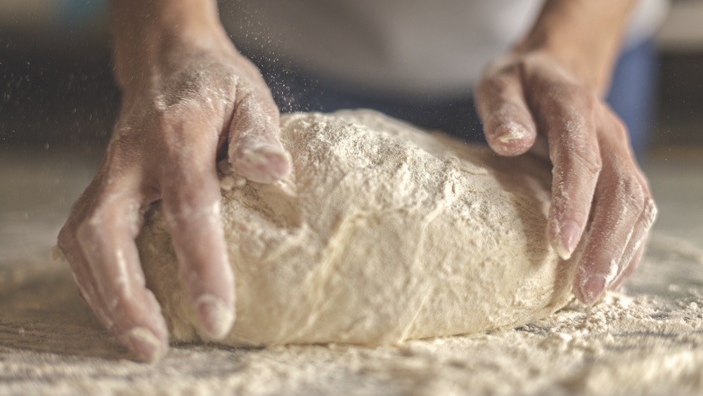 this photo illustrates the role of yeast in pizza dough