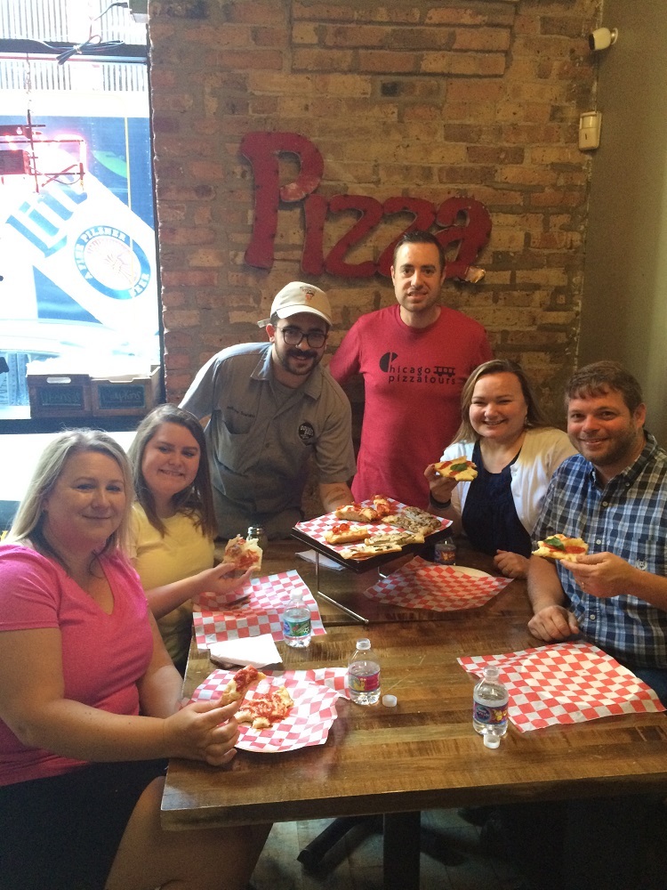 Anthony Scardino and Jonathan Porter pose with the pizza tour group.