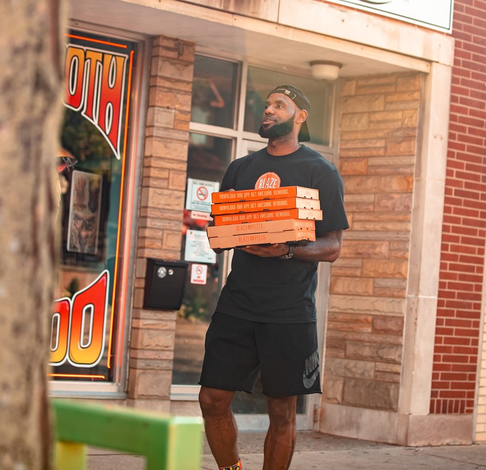 this photo shows the star power of Blaze Pizza in the form of LeBron James
