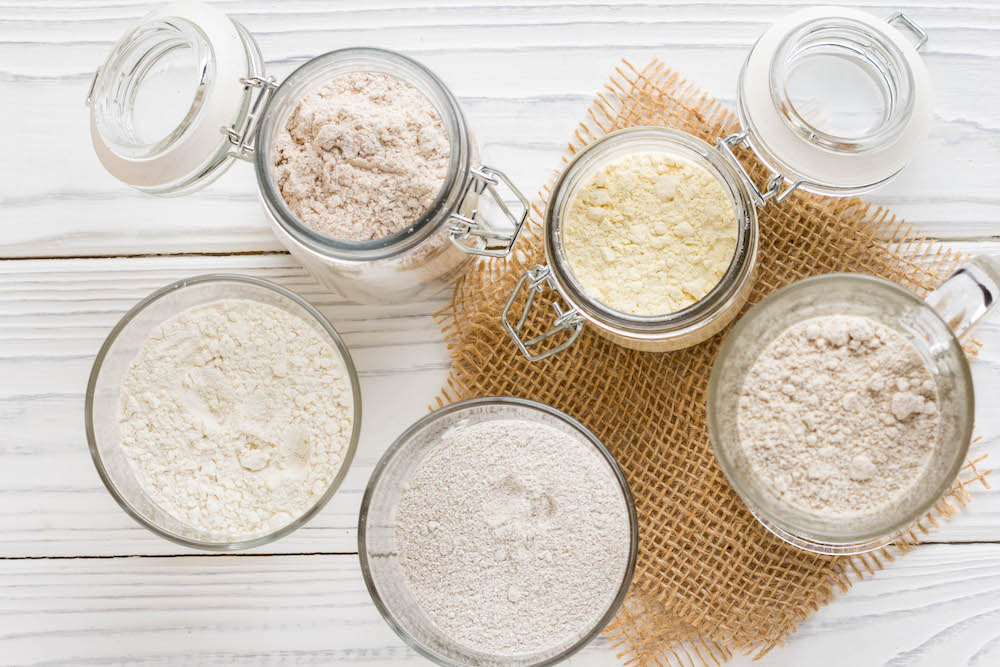 this picture depicts a variety of flours that can be used for alternative pizza crusts