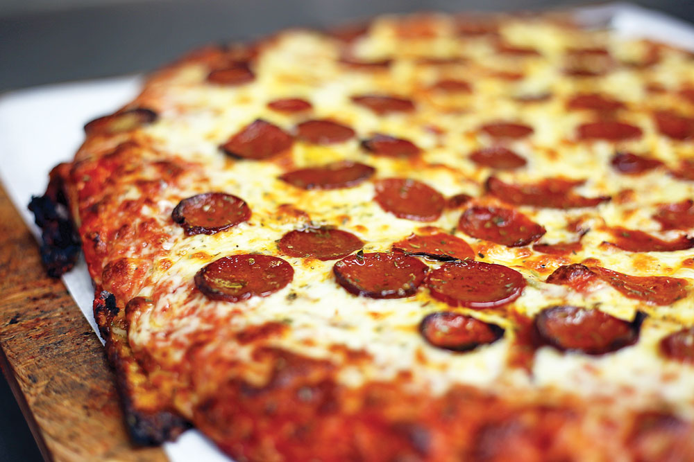 The pies at Bocce Club Pizza have been made in the classic Buffalo style for decades.