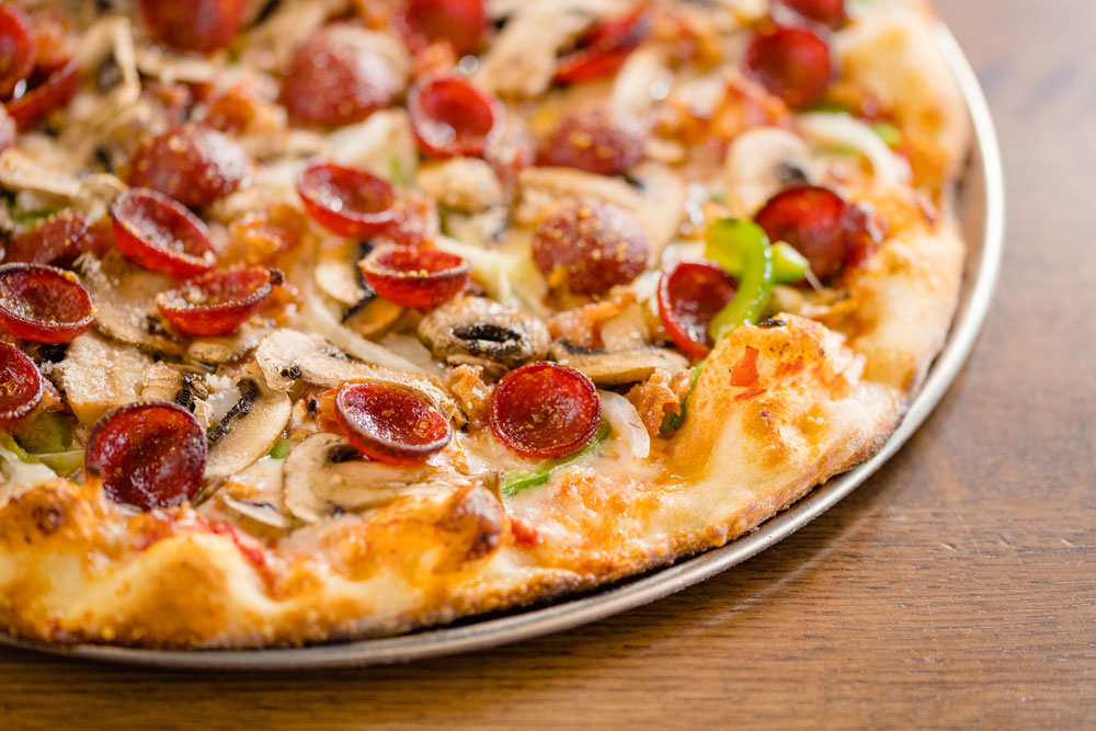 The E&D Special (above) features mushrooms, onions, green peppers, bacon, Italian sausage and pepperoni