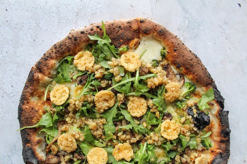 this photo shows a view of the Walnut St. Pizza created by Pizzeria Vetri and Honeygrown in Philadelphia