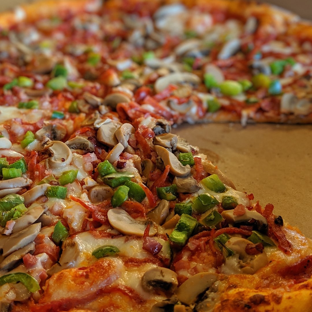 this photo shows a Windsor-style pizza from Armando's Pizza