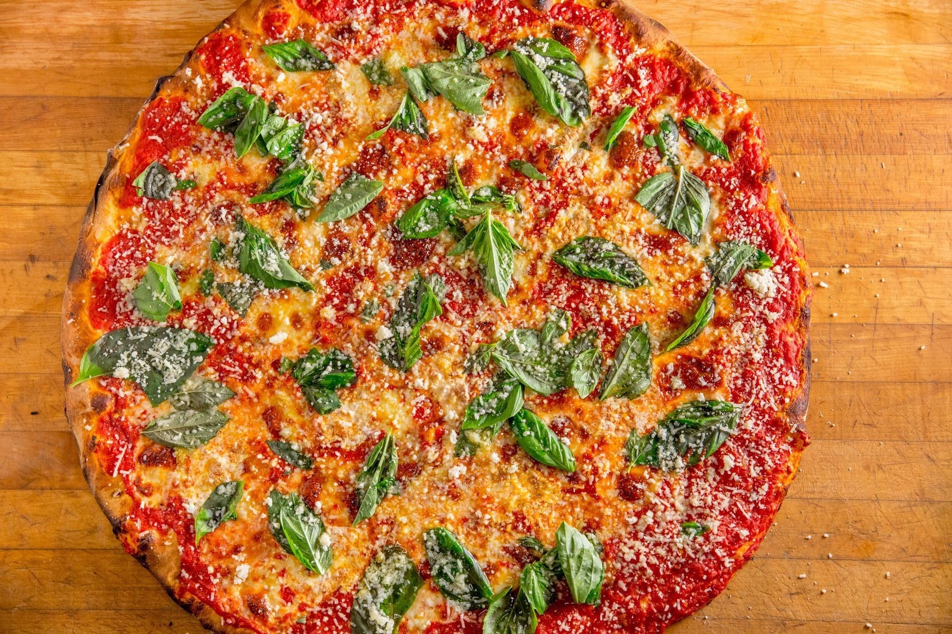 this is a photo of a homemade Margherita pizza with a recipe from Artichoke Basille's