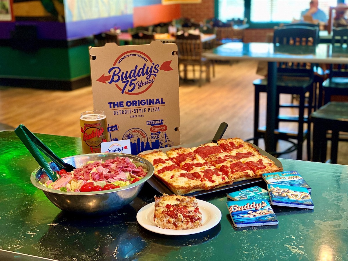 this is a photo of a Detroit-style pizza with other dishes from Buddy's Pizza in Detroit