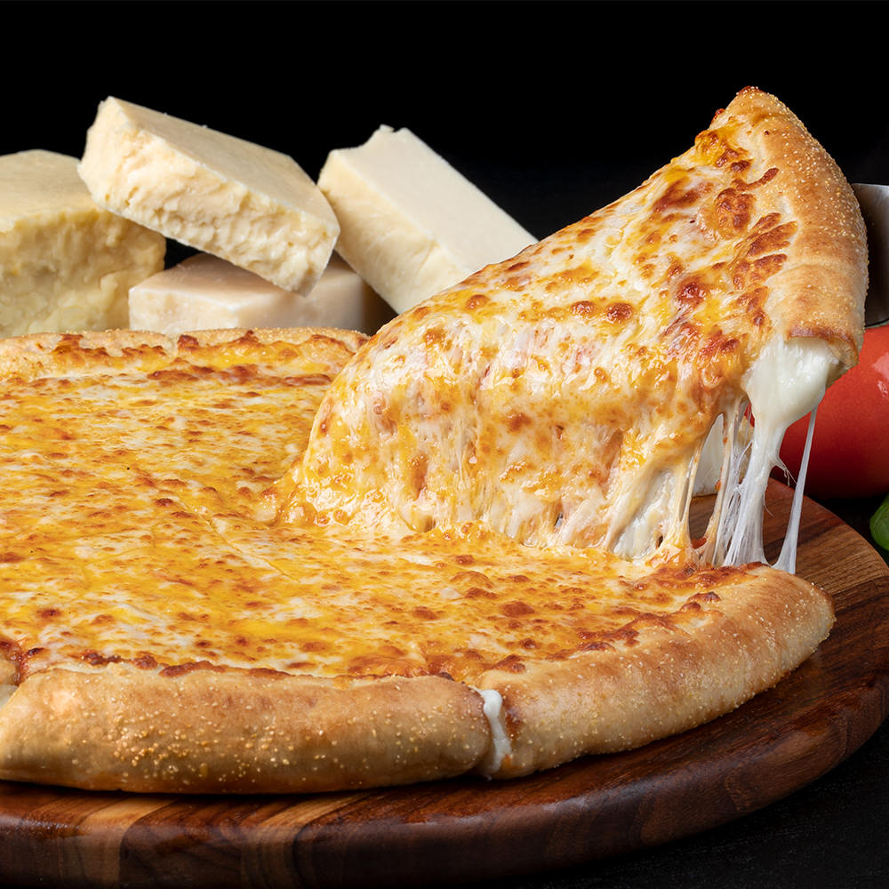 this photo shows a cheese pull from a Pizza Guys pizza topped with five cheeses