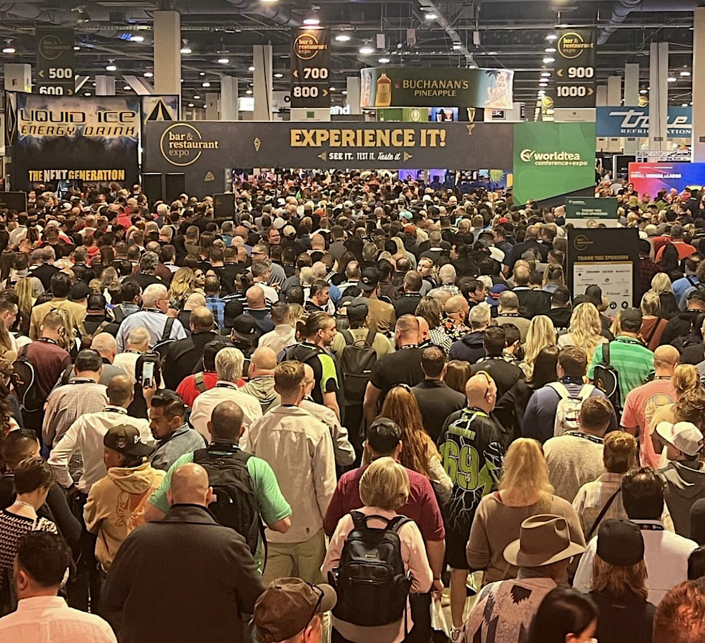 this photo shows a packed exhibit hall