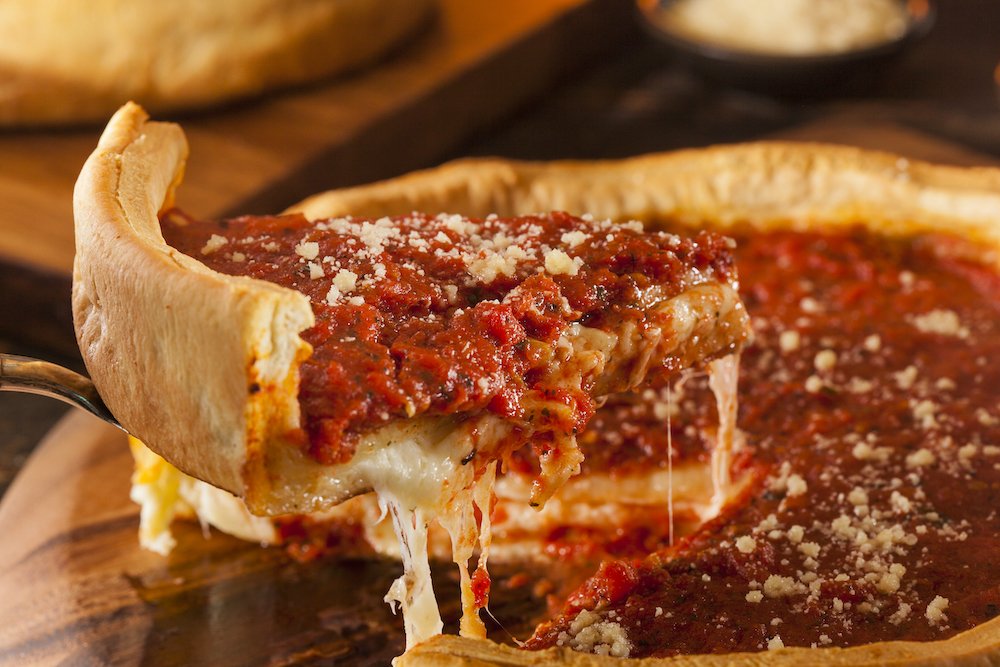 this is a photo of a Chicago Style Deep Dish Cheese Pizza with Tomato Sauce