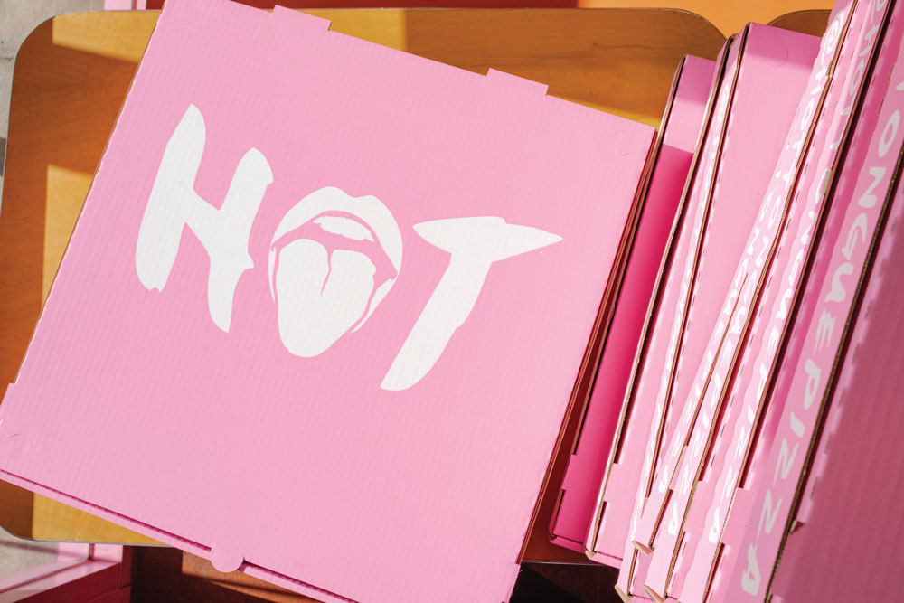 pink hot tongue pizza box with logo