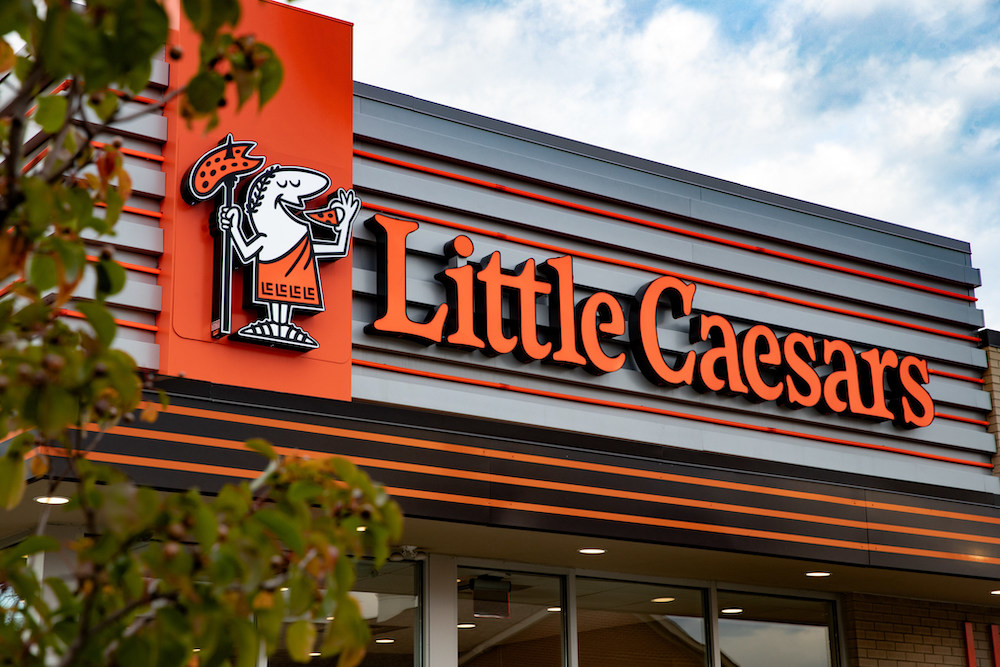This photo shows the exterior of a Little Caesars restaurant.