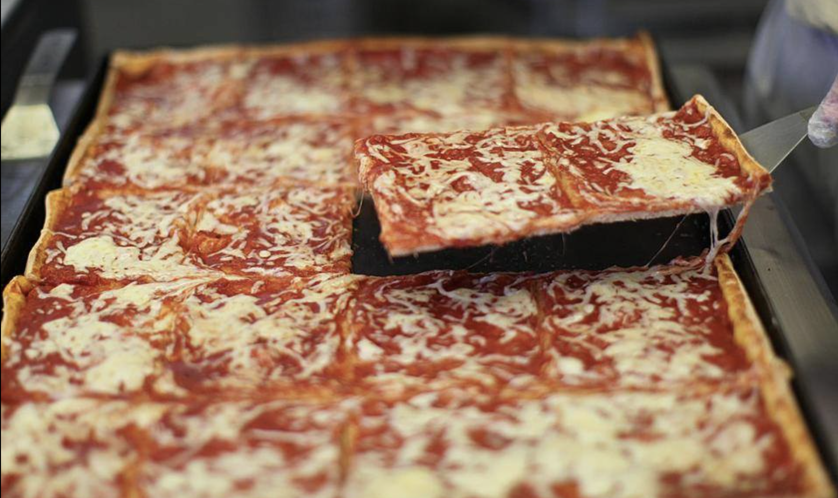 A slice of "beach pizza" from Tripoli Bakery.