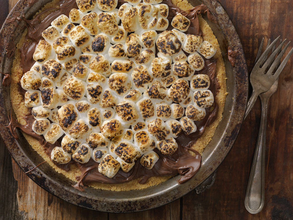 This photo shows a S'mores pizza with hazelnut/chocolate spread