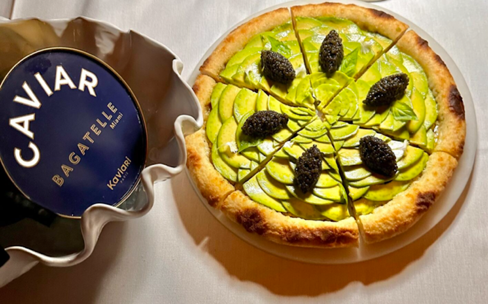 An Avocado Pizza topped with caviar.
