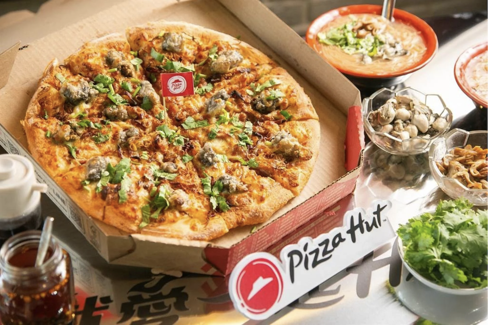 A coriander, intestine and oyster vermicelli pizza offered at Pizza Hut Taiwan
