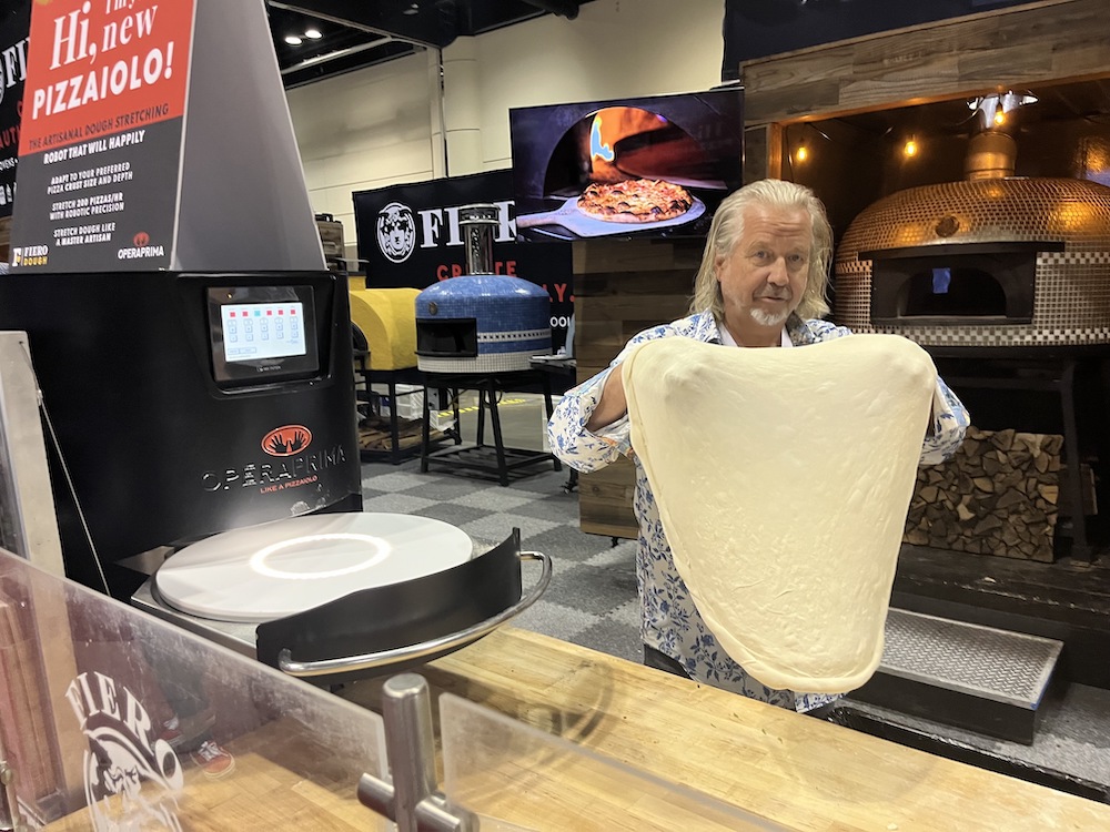 Peter de Jong, founder and owner of Fiero Ovens, demos his new Operaprima dough-stretching machine.