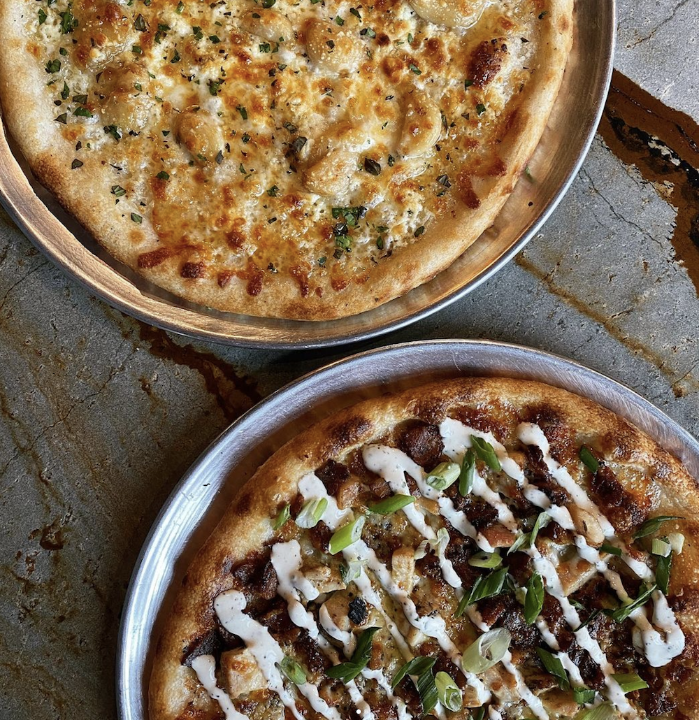 Two pizzas from Catch-a-fire pizza.