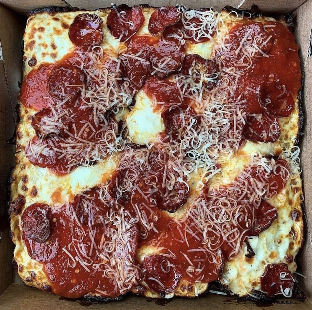 One of the best selling pies from Down North Pizza: four-cheese blend, beef pepperoni and Norf Sauce on a square pie. 