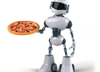 This photo shows a silver human-like robot with a head, torso, arms and legs holding a pizza.