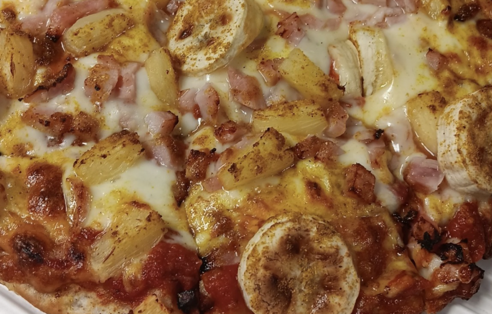 A new crazy pizza featuring bananas and curry powder.