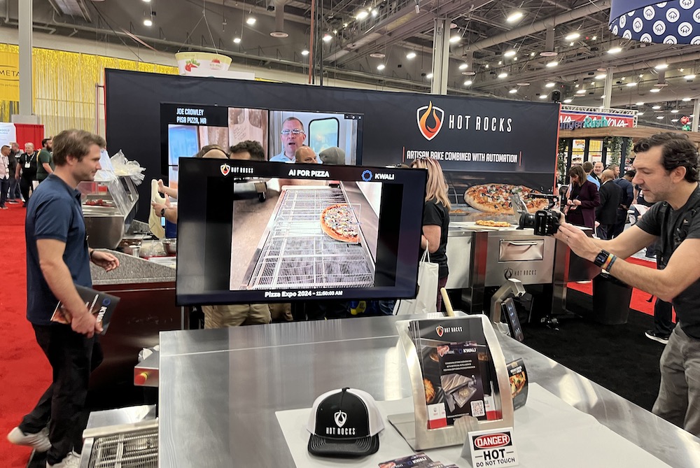 This photo shows the Hot Rocks booth at Pizza Expo.