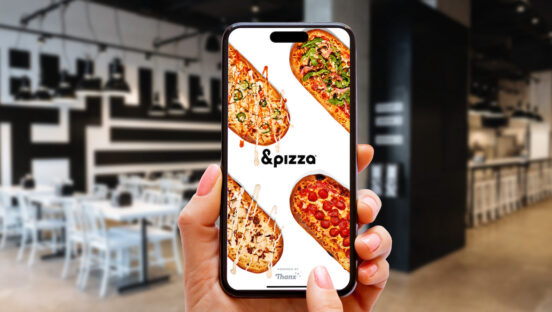 This photo shows a phone with the &pizza logo and several oblong-shaped pizzas.