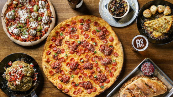 This photo shows an array of pizzas and other menu items from Rotolo's.