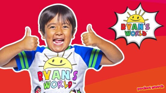This photo shows Ryan of Ryan's World giving a joyous thumbs-up against a red background.