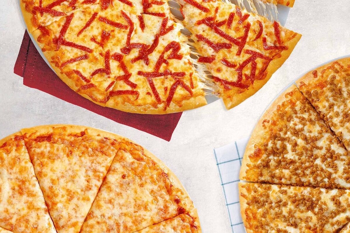 Three slices pizzas sit in a glamor shot.