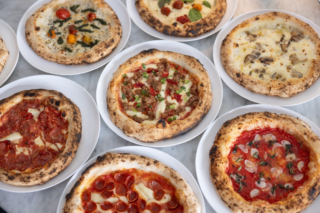 This photo shows the wide variety of pizzas available for nationwide shipping from Bocado.