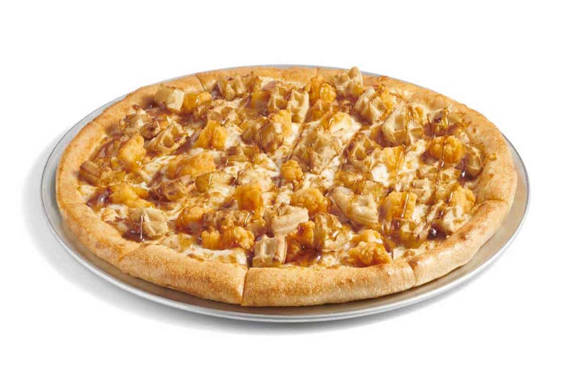 This photo shows the Chicken and Eggo Waffles pizza from Cicis Pizza.
