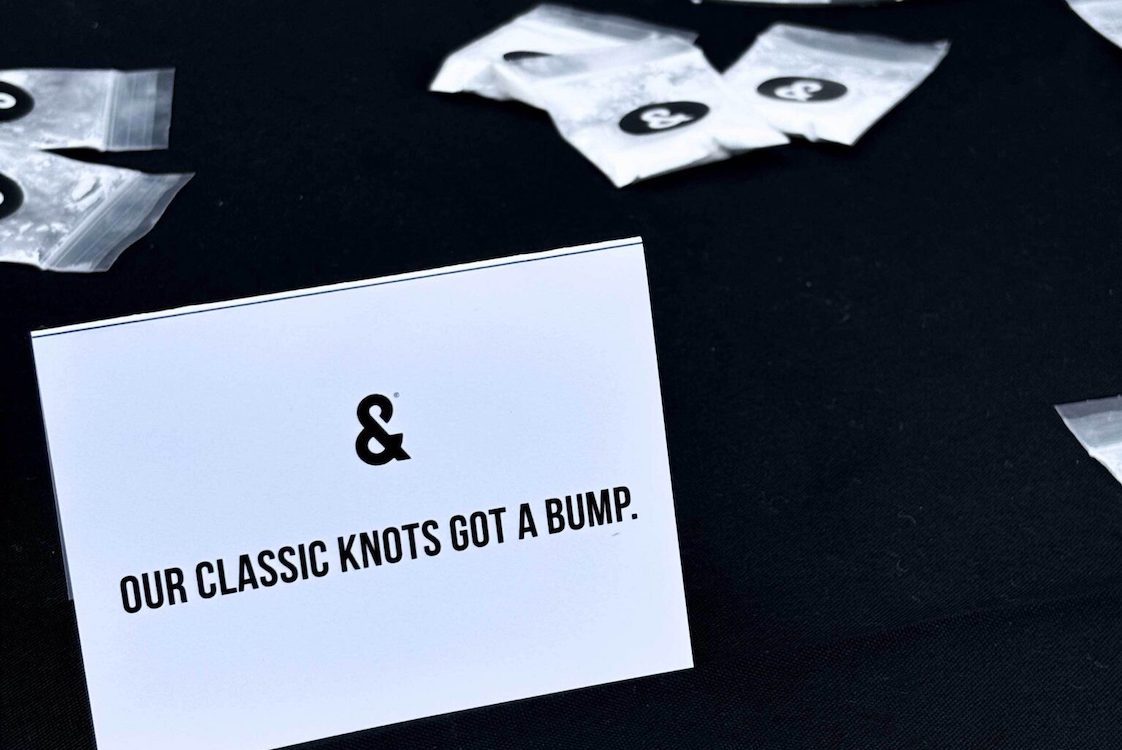 This image shows a sign that reads "Our Classic Knots Got a Bump."