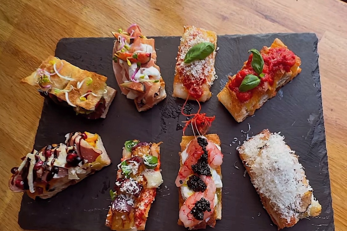This photo shows some of the miniature pizzas offered in the Pizza Omokase experience at Biga Bite.