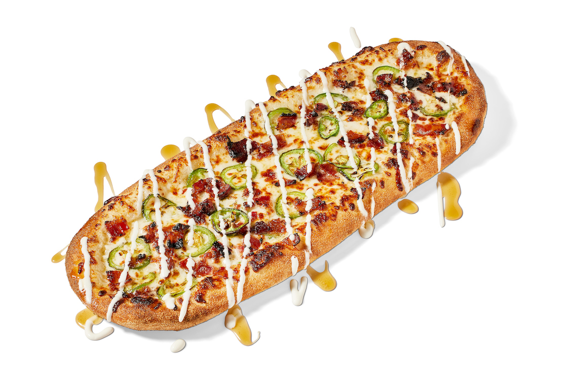 This photo shows the Popper Pepper Pie, featuring mozzarella, jalapeños, bacon and cream cheese.
