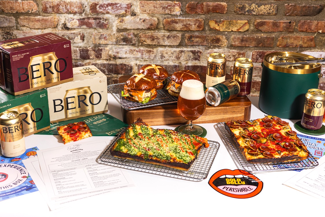 This photo shows a selection of Detroit-style pizzas, burgers and BERO beers in glasses and cans.