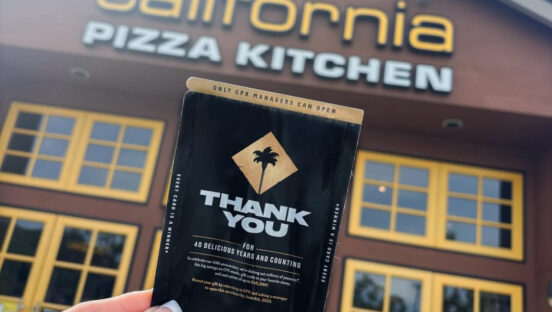 This photo shows CPK's thank-you card, which offers various prizes when it's opened on the next visit to the restaurant.