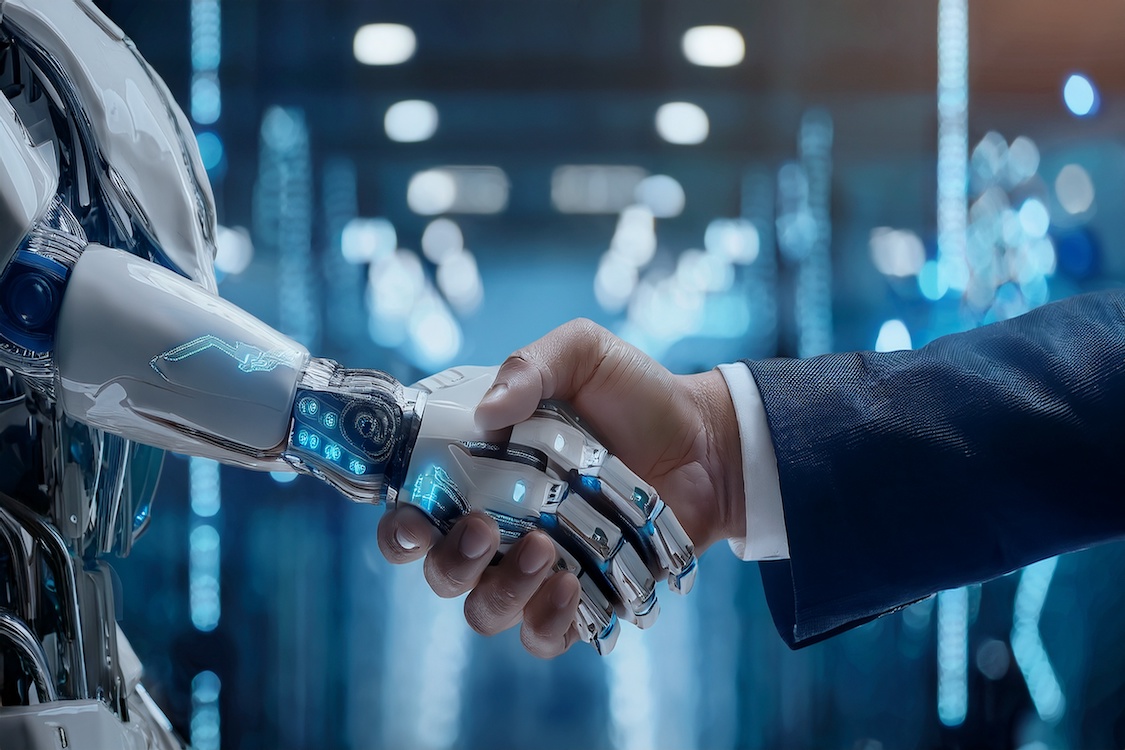 This AI-generated photo shows a robot's hand grasping a man's hand.