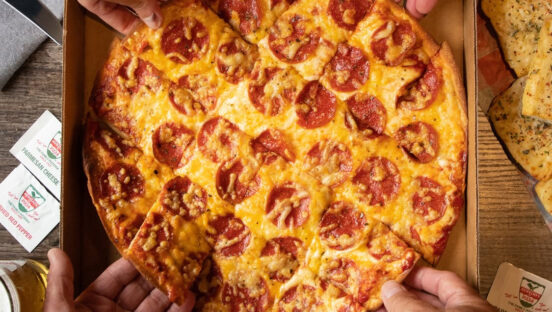 This photo shows a pepperoni pizza with mozzarella and cheddar cheese from Aurelio's Pizza.