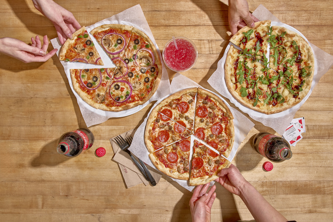 This photo shows the three Masterpiece pizzas soon to be added to the MOD Pizza menu.