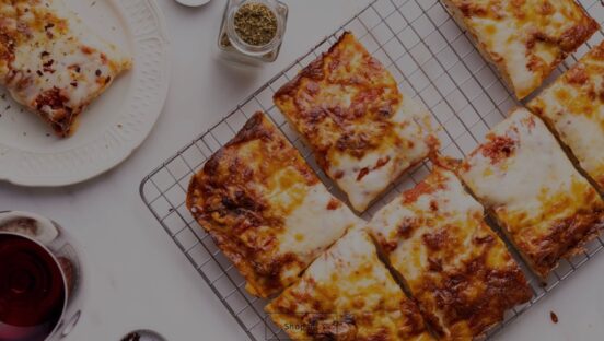 This photo shows sliced pizza from Pizza Freak Co.