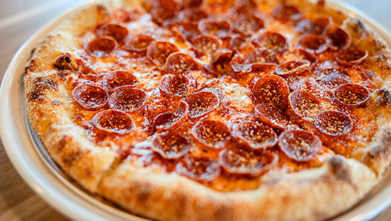 This photo shows a tasty-looking pepperoni pizza.