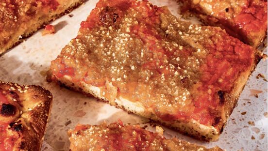 This photo, cropped from the original, focuses on a single slice of the Vegan Vidalia pizza described in the story.