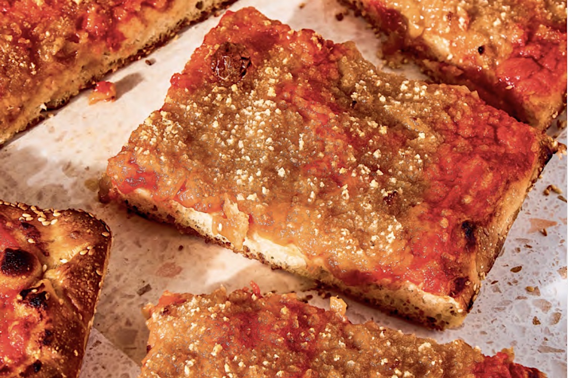 This photo, cropped from the original, focuses on a single slice of the Vegan Vidalia pizza described in the story.