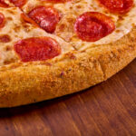 This photo shows the new Sweet Heat pizza with a bacon-flavored crust from Hungry Howie's that's described in the article.