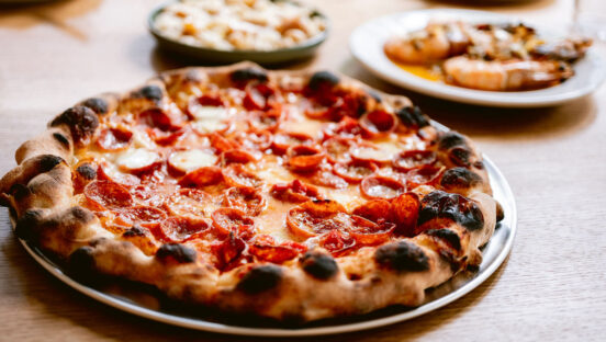 This photo shows a beautiful pepperoni pizza, cooked from frozen with a blistered crust.