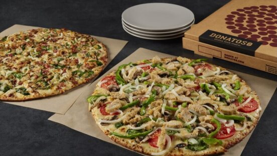 This photo shows two of the pizzas topped with the creamy Parm sauce described in the story.