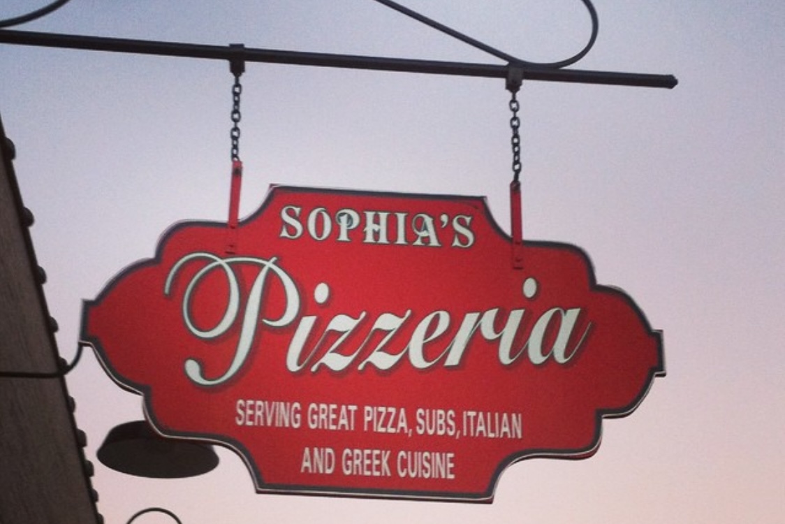 This photo shows the exterior sign at Sophia's Pizzeria.