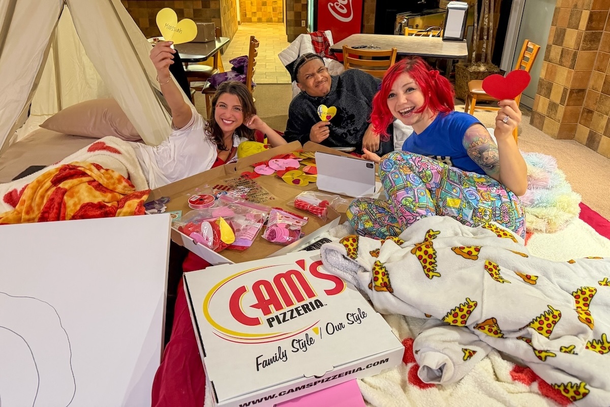 This photo shows Giuliana and Thug Shells reclining on blankets on the floor in the pizzeria, as if they're at a slumber party.