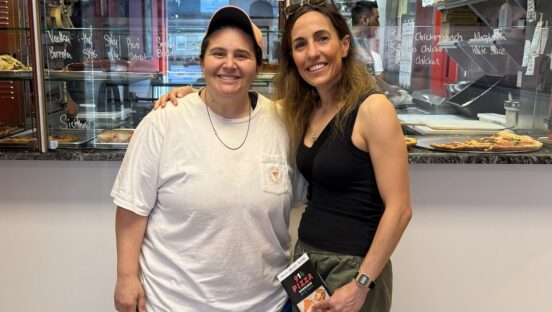 This photo shows Christy and Tori Tiso posing and smiling together.