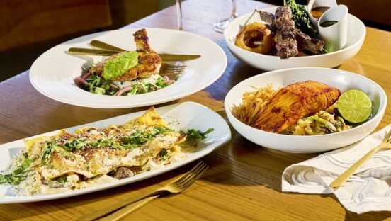 This photo shows several of the menu items listed in the story, including a lasagna dish, the pan-roasted chicken, the salmon and the filet skewers.